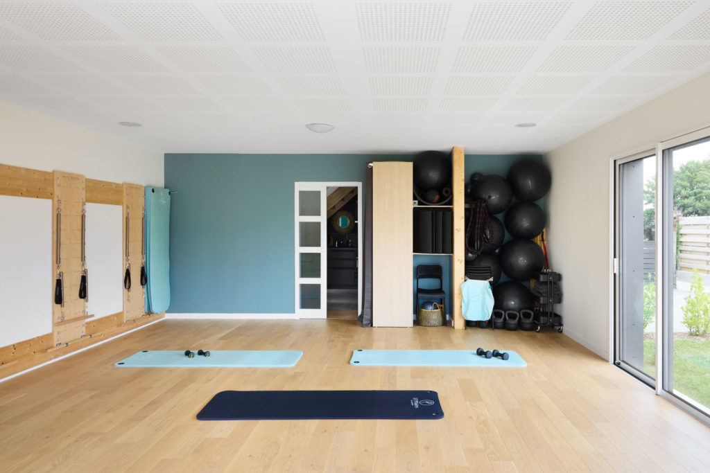 salle-pilates-détente-maison-trecobois