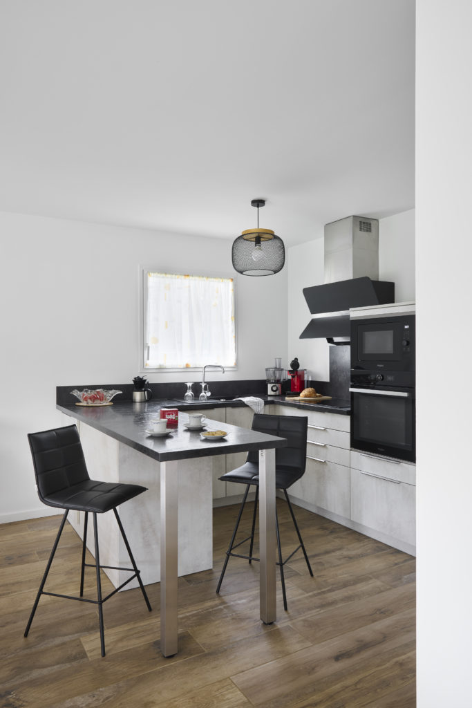 Maison en bois en lotissement cuisine